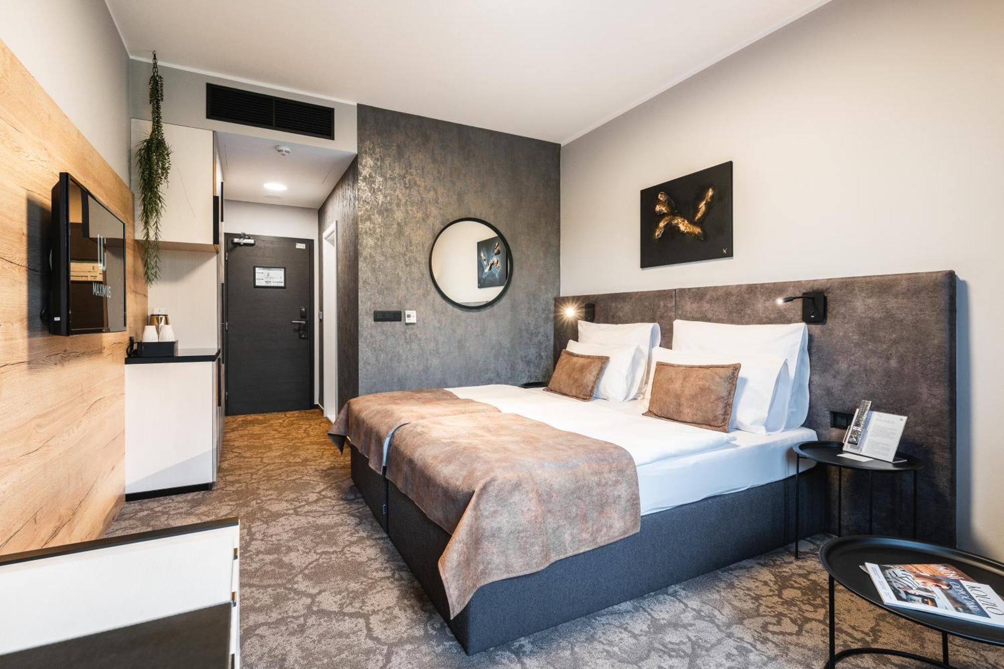 Deluxe Plus Doppel- oder Zweibettzimmer